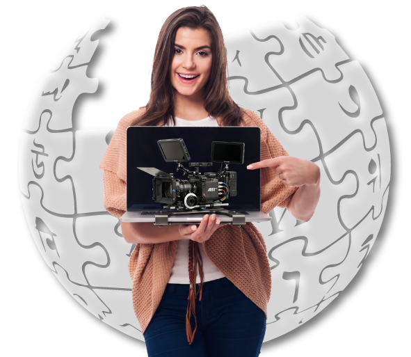 Wikipedia profile creation expert for actors holding laptop displaying film camera equipment